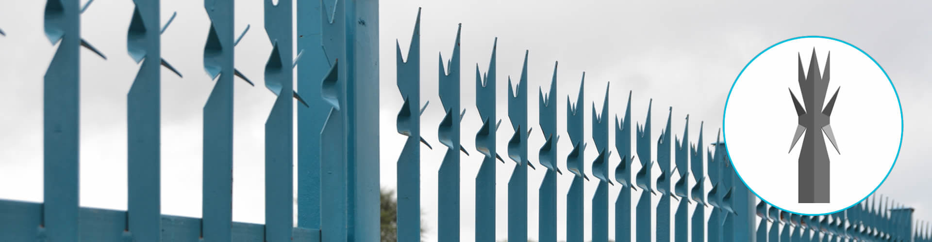 Blue painted palisade fence with square post and angle section pales. The pale head has seven spikes.
