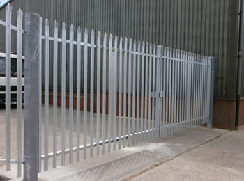 The palisade gate is made of two swing leafs, the gate is closed, deter the way to the plant together with the palisade fence.